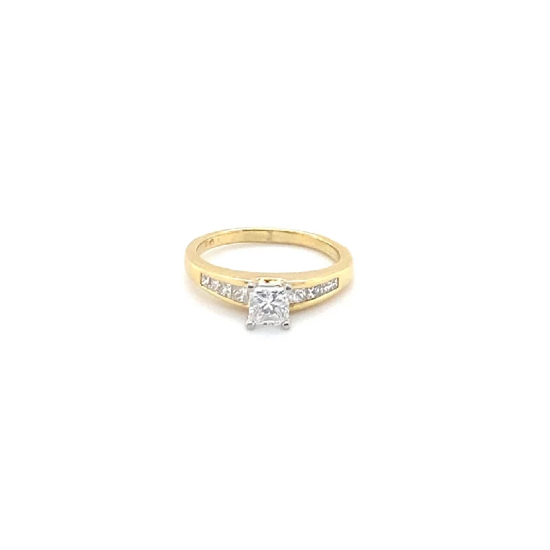 18K Contemporary Engagement Ring with 0.55ct Princess Diamond and 0.39tw Princess Diamonds