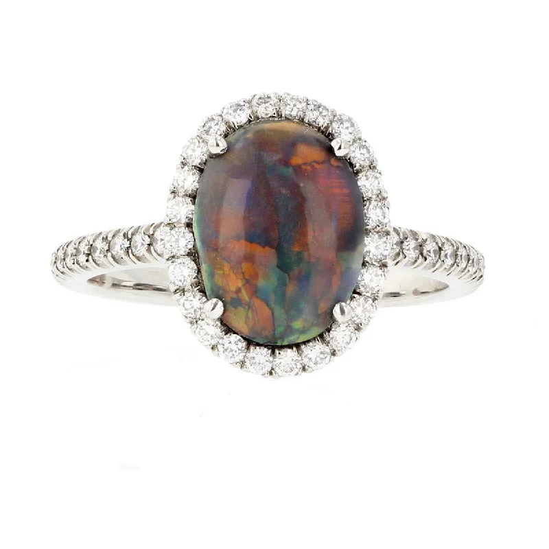 Platinum Cabochon Black Opal and Diamond Halo Ring